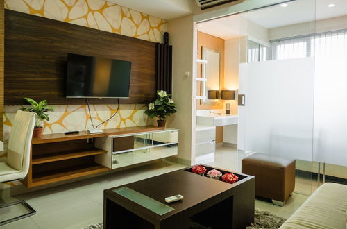 Photo 22 - Luxurious 1BR At Dago Suites Apartment