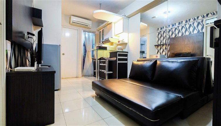 Photo 1 - Monochrome Style 2 Bedrooms at Kalibata City Apartment By Travelio