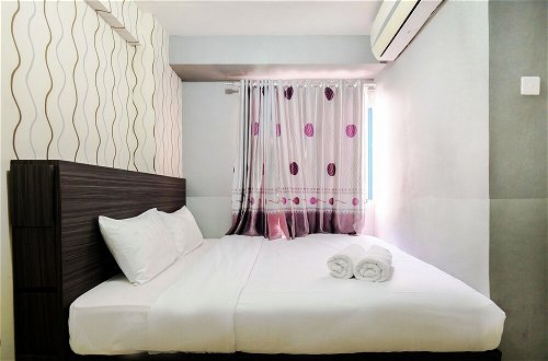 Photo 2 - Monochrome Style 2 Bedrooms at Kalibata City Apartment By Travelio