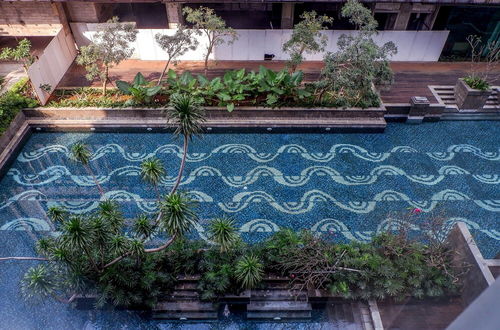 Foto 42 - Cozy Pool View Kemang Village Residence Apartment with Direct Access to Mall