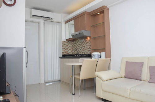 Photo 12 - Cozy Stay And Comfort 2Br At Bassura Apartment