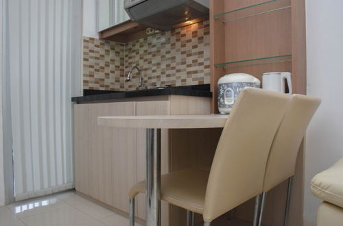 Photo 13 - Cozy Stay And Comfort 2Br At Bassura Apartment