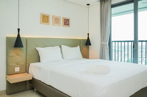 Photo 1 - Comfort And Minimalist Studio At Embarcadero Bintaro Apartment