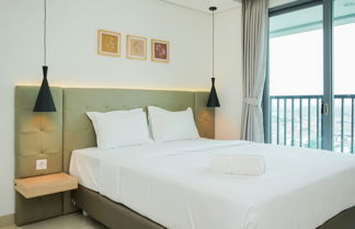 Photo 1 - Comfort And Minimalist Studio At Embarcadero Bintaro Apartment