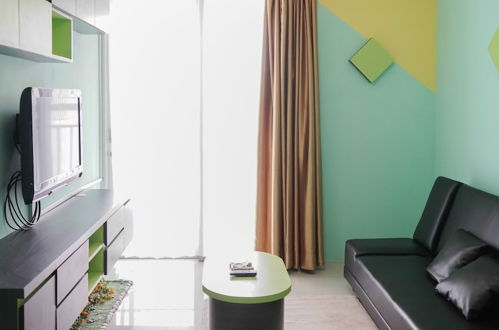 Foto 6 - Elegant and Comfy 1BR Green Central City Apartment