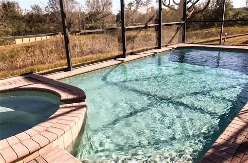Photo 13 - Extended Pool Deck With Spa 2 King Suites! 5 Bedroom Home by RedAwning