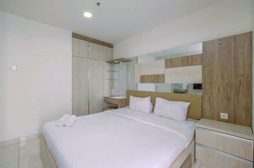 Photo 2 - Homey And Comfy 2Br Sentul Tower Apartment