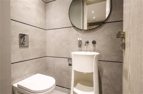 Foto 15 - Elite LUX Holiday Homes - Luxurious 1BR Suite in Signature Livings JVC - Dubai