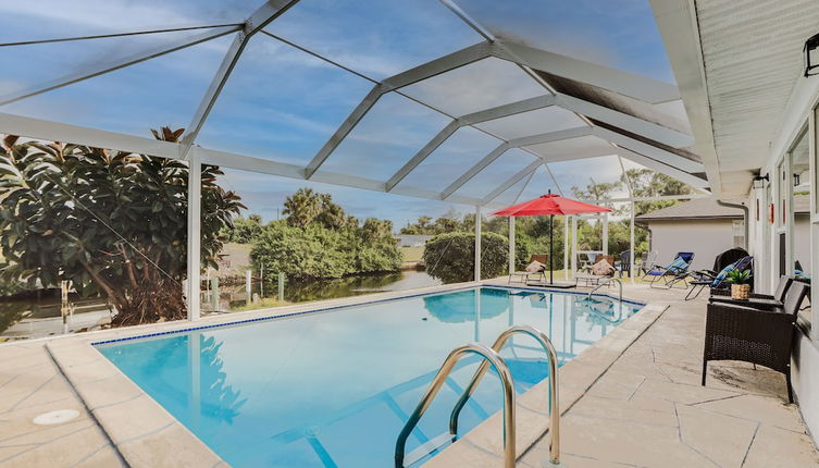 Photo 1 - Riverfront Florida Retreat w/ Pool, Patio & Grill