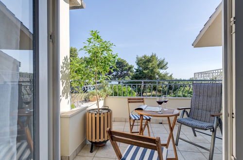 Photo 17 - Beachfront Apartment With Balcony and Parking