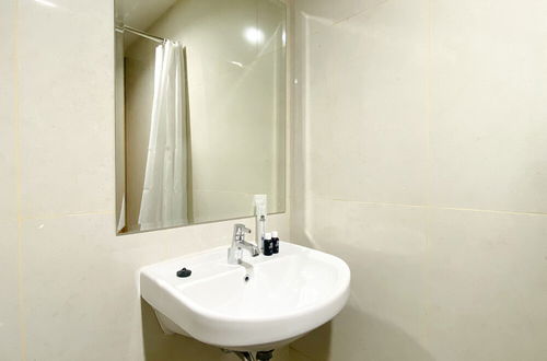 Photo 16 - Cozy Stay Studio Apartment At Gateway Park Lrt City Bekasi