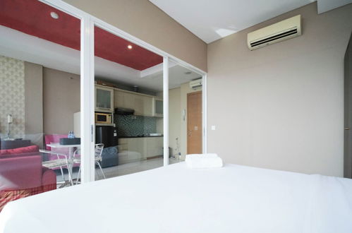 Photo 6 - Spacious And Comfy 1Br Apartment Connected To Mall At Aryaduta Residence