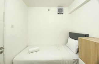 Foto 3 - Comfort Living And Strategic 2Br At Bassura City Apartment