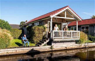 Photo 1 - Cozy Chalet Right on the Water in Friesland