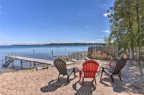 Photo 1 - Cozy Suttons Bay Cottage w/ Shared Dock & Fire Pit