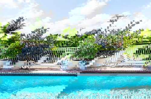 Photo 25 - Luxe 4BR Waterfront w Htd Pool 5min to Beach