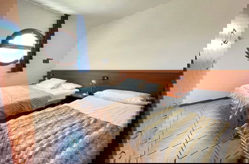 Foto 2 - Cozy Apartment With Shared Pool