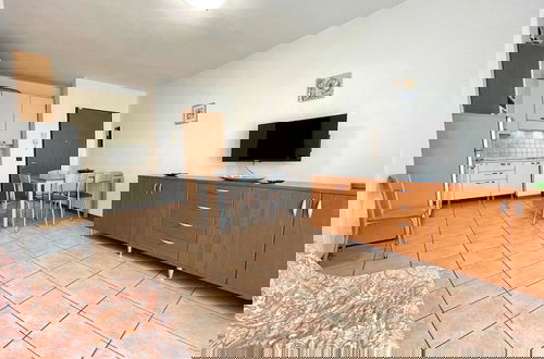 Foto 6 - Cozy Apartment With Shared Pool