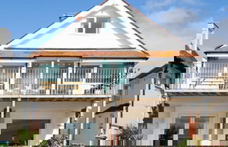 Photo 1 - Absolute Beachfront With Decked Garden Oasis and Views