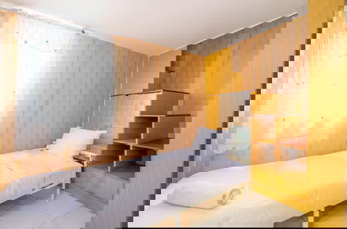 Foto 4 - Comfortable And Tidy Studio At Dave Apartment