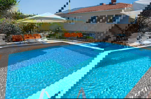 Photo 10 - Apartments Vidak - One Bedroom Apartment With Terrace and Pool View -