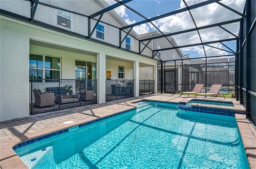 Photo 25 - Spacious Home Near Disney With Private Pool and Game Room