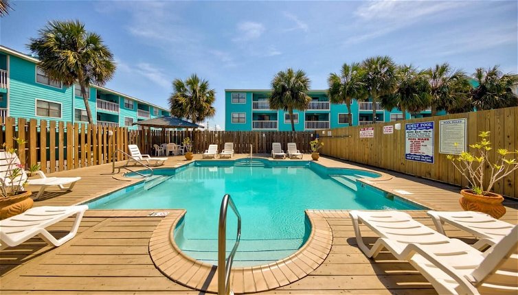 Photo 1 - Serene Condo on the Beach With Pool Covered Deck