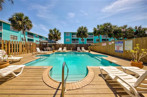 Photo 1 - Serene Condo on the Beach With Pool Covered Deck