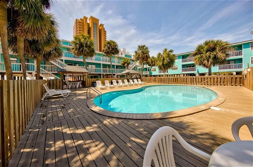 Photo 32 - Serene Condo on the Beach With Pool Covered Deck