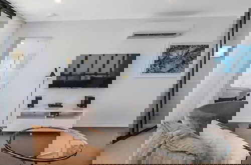 Foto 18 - Oceanfront at Rhapsody by Coastal Letting Co