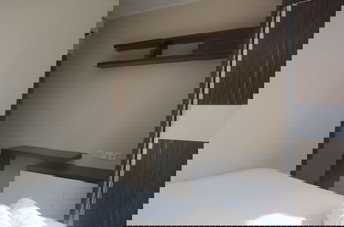 Foto 3 - Homey 2Br Apartment At The Mansion At Dukuh Kemayoran