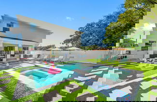 Foto 1 - New-6br Discovilla- Sleeps16 Heated Pool & More