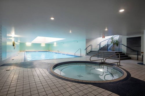 Photo 30 - View of Water Pool Hot Tub Gym Steam Rm 2 Bdrm 2 Bath 24 Concierge Steps to Seawall