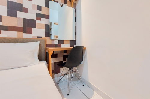 Foto 8 - Warm And Homey Studio Room Casa De Parco Apartment