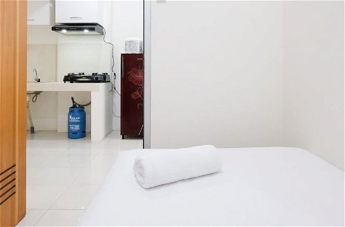 Photo 8 - Homey 2Br At Puncak Permai Apartment