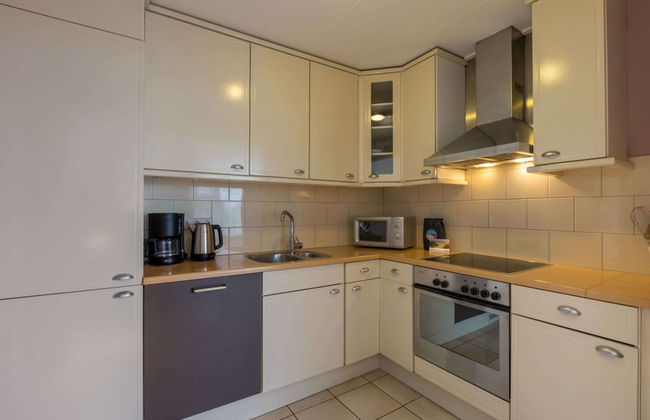 Cozy 4-person Stay at Rustenpolder - Foto 6