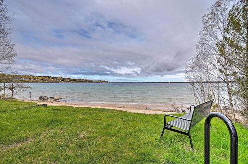 Photo 2 - Charlevoix Cabin w/ Patio & Grill - Steps to Lake