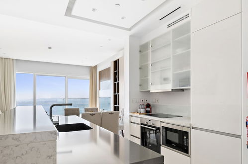 Photo 12 - WelHome - Luxe Apt With Dazzling Views Steps From The Beach