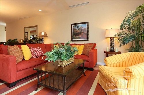 Photo 5 - Impressive 2nd-floor Unit in Coco Done in Red and Orange Hues
