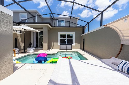 Photo 31 - Luxurious Family-friendly 5 Bd 12 Guests w Screened Pool Close to Disney
