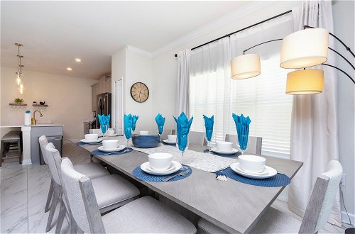 Photo 27 - Luxurious Family-friendly 5 Bd 12 Guests w Screened Pool Close to Disney