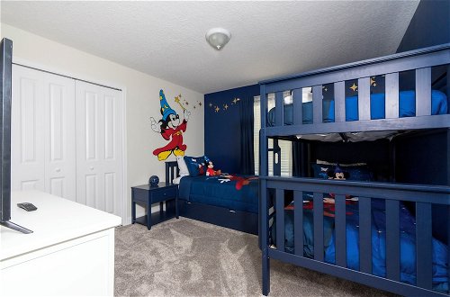 Photo 37 - Luxurious Family-friendly 5 Bd 12 Guests w Screened Pool Close to Disney