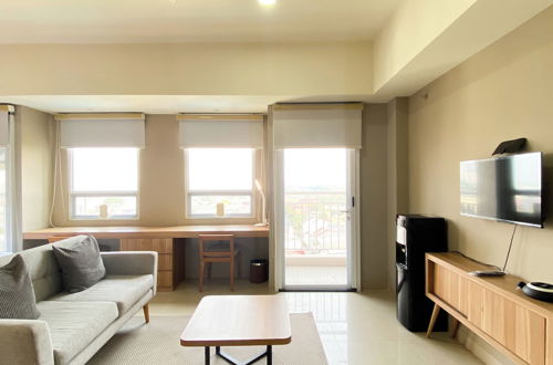 Photo 10 - Spacious And Elegant Studio Apartment Mustika Golf Residence