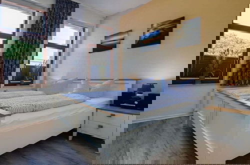 Foto 4 - At Home Comfortable Holiday Residence