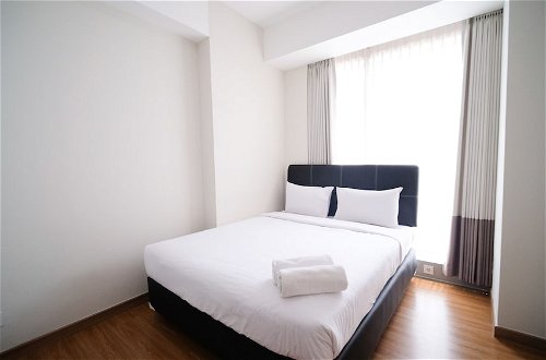 Foto 11 - Homey 3Br With Private Lift At Grand Sungkono Lagoon Apartment