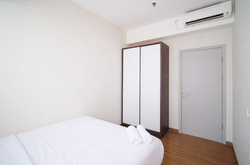 Photo 10 - Homey 3Br With Private Lift At Grand Sungkono Lagoon Apartment