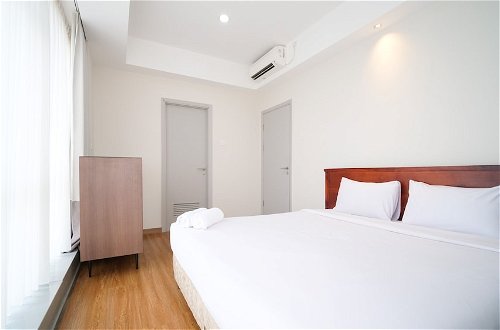Foto 4 - Homey 3Br With Private Lift At Grand Sungkono Lagoon Apartment