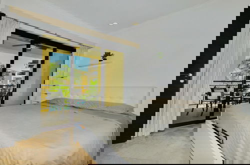 Photo 13 - Amazing 1BR 2BA Condo Great Location w Pool GYM