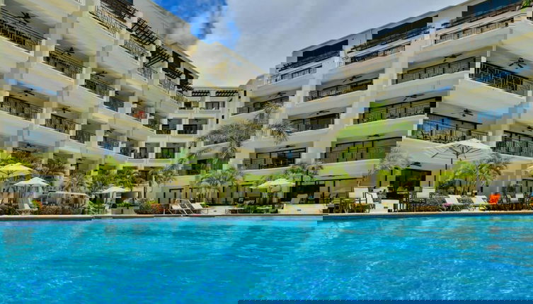 Photo 1 - Amazing 1BR 2BA Condo Great Location w Pool GYM