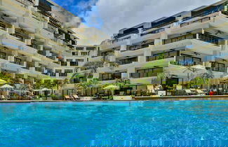 Photo 1 - Amazing 1BR 2BA Condo Great Location w Pool GYM